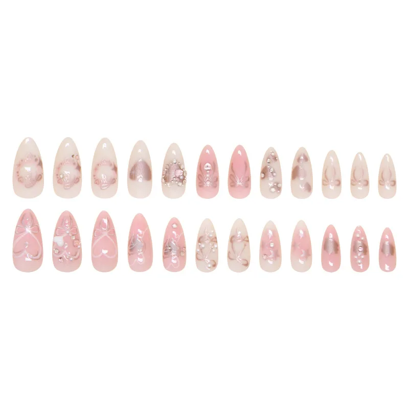 24pcs 달콤한 거짓 손톱 패치 Bowknots와 분리형 가짜 손톱 팁 사랑 심장 진주 디자인 핑크 아몬드 한국어 프레스 손톱