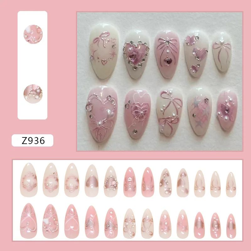 24pcs 달콤한 거짓 손톱 패치 Bowknots와 분리형 가짜 손톱 팁 사랑 심장 진주 디자인 핑크 아몬드 한국어 프레스 손톱