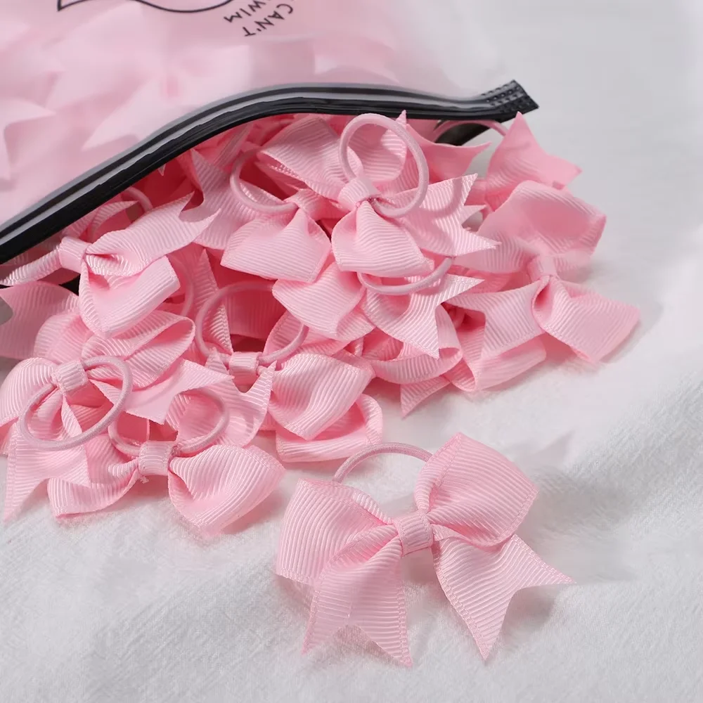 아기 활 10Pcs 새로운 색상 Grosgrain 리본 활 탄성 Hairties 헤어 밴드 여자 봄 머리 밧줄 헤어 액세서리 도매