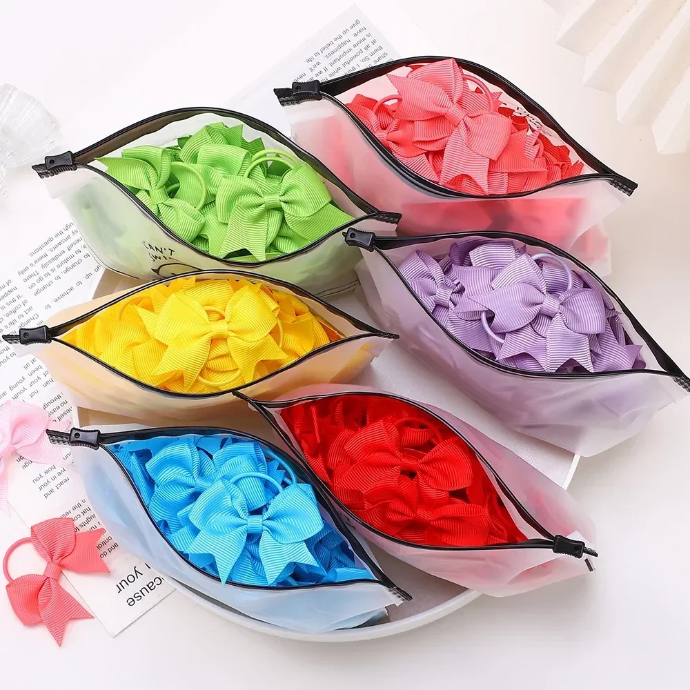 아기 활 10Pcs 새로운 색상 Grosgrain 리본 활 탄성 Hairties 헤어 밴드 여자 봄 머리 밧줄 헤어 액세서리 도매 title=아기 활 10Pcs 새로운 색상 Grosgrain 리본 활 탄성 Hairties 헤어 밴드 여자 봄 머리 밧줄 헤어 액세서리 도매 