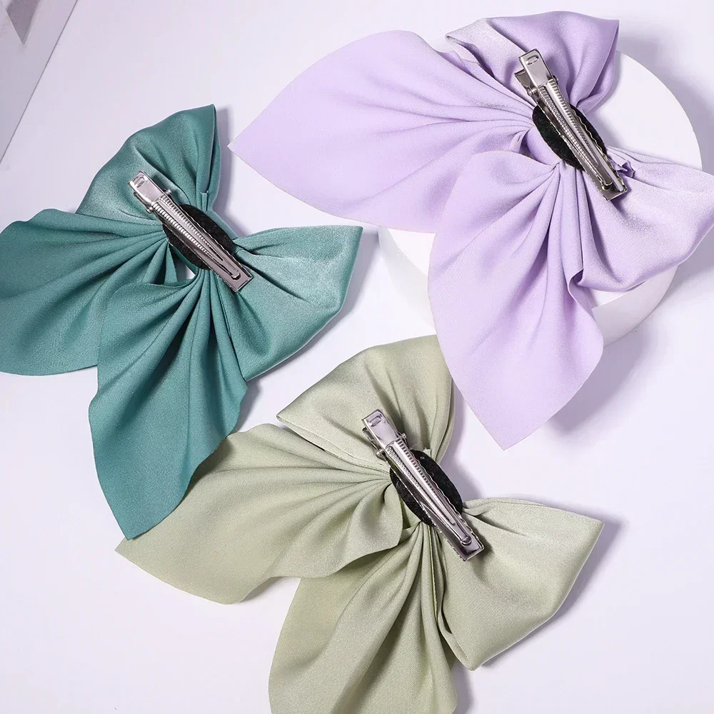 새로운 달콤한 활 머리핀 여자를위한 솔리드 컬러 Bowknot 헤어 클립 새틴 나비 바레트 Duckbill 클립 키즈 헤어 액세서리