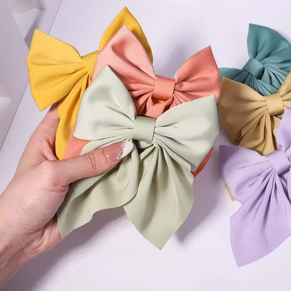 새로운 달콤한 활 머리핀 여자를위한 솔리드 컬러 Bowknot 헤어 클립 새틴 나비 바레트 Duckbill 클립 키즈 헤어 액세서리