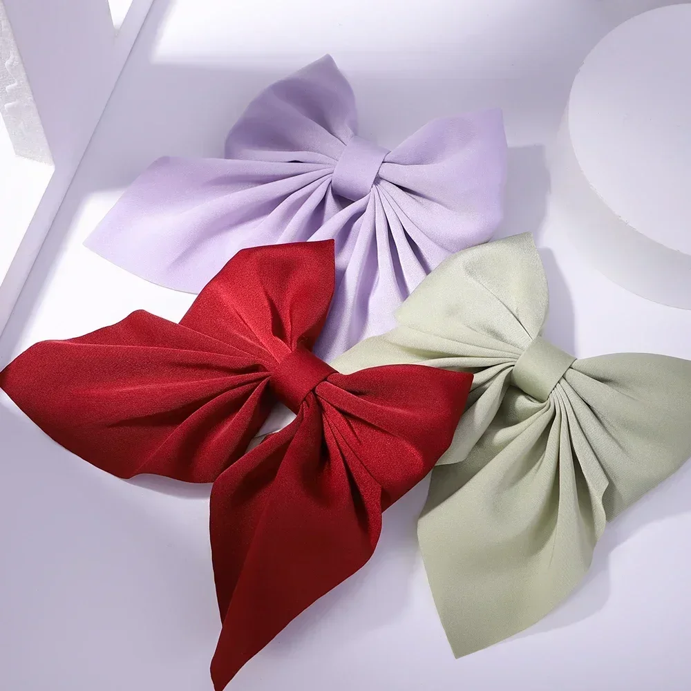 새로운 달콤한 활 머리핀 여자를위한 솔리드 컬러 Bowknot 헤어 클립 새틴 나비 바레트 Duckbill 클립 키즈 헤어 액세서리 title=새로운 달콤한 활 머리핀 여자를위한 솔리드 컬러 Bowknot 헤어 클립 새틴 나비 바레트 Duckbill 클립 키즈 헤어 액세서리 