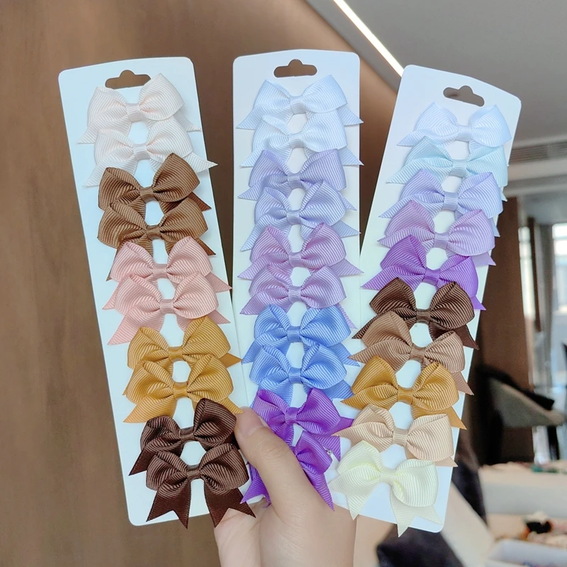 10 개/대 귀여운 소녀를위한 솔리드 BB 헤어 클립 리본 Bowknots 부티크 바레트 헤어핀 모자를 쓰고 있죠 헤어 액세서리 선물